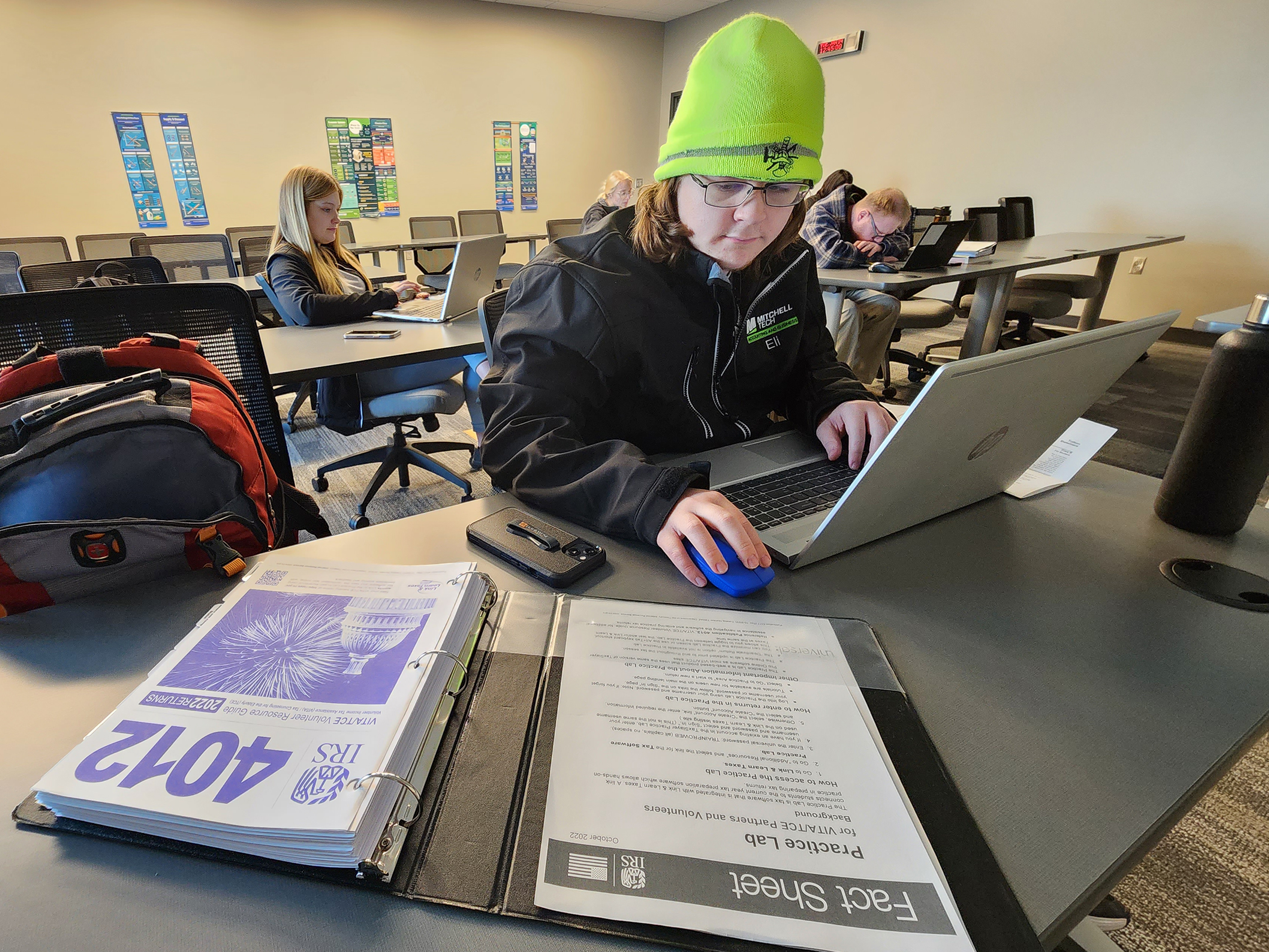 Mitchell Tech student helping with Free Income Tax Preparation Service